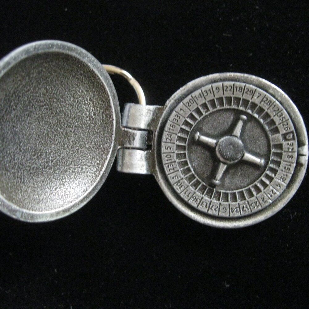 "DESJARINS CASINO KEY TAG W/SPINNING WHEEL INSIDE FOR ROULETTE" VERY UNIQUE